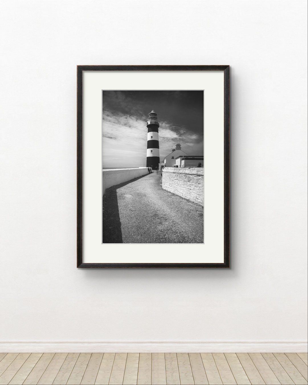 a museum like wall. fine art photography print of a lighthouse on The Wild Atlantic Way. Cork. Kinsale. Irish coast.