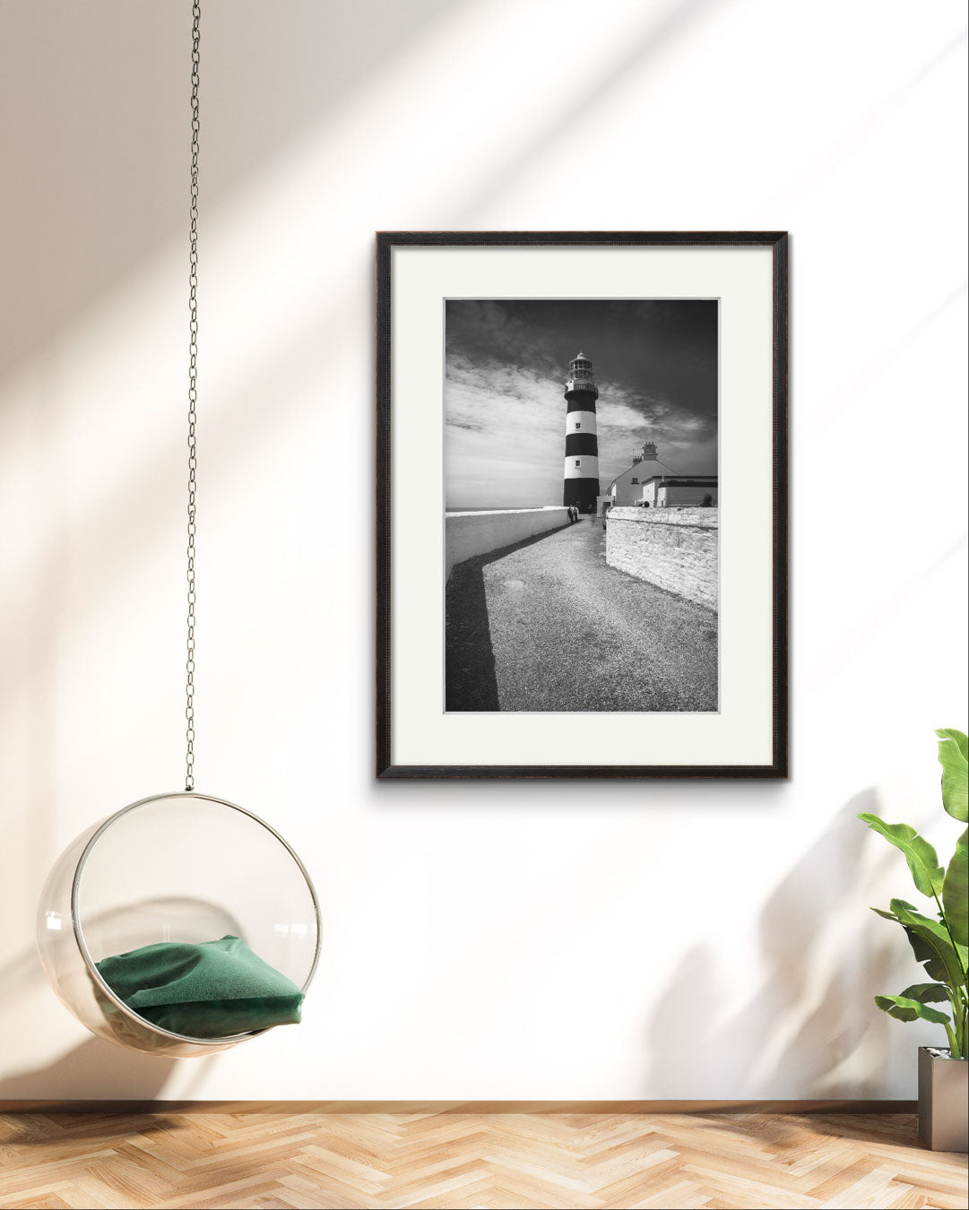 a modern living room decorated with fine art photography print of a lighthouse on The Wild Atlantic Way. Cork. Kinsale. Irish coast.