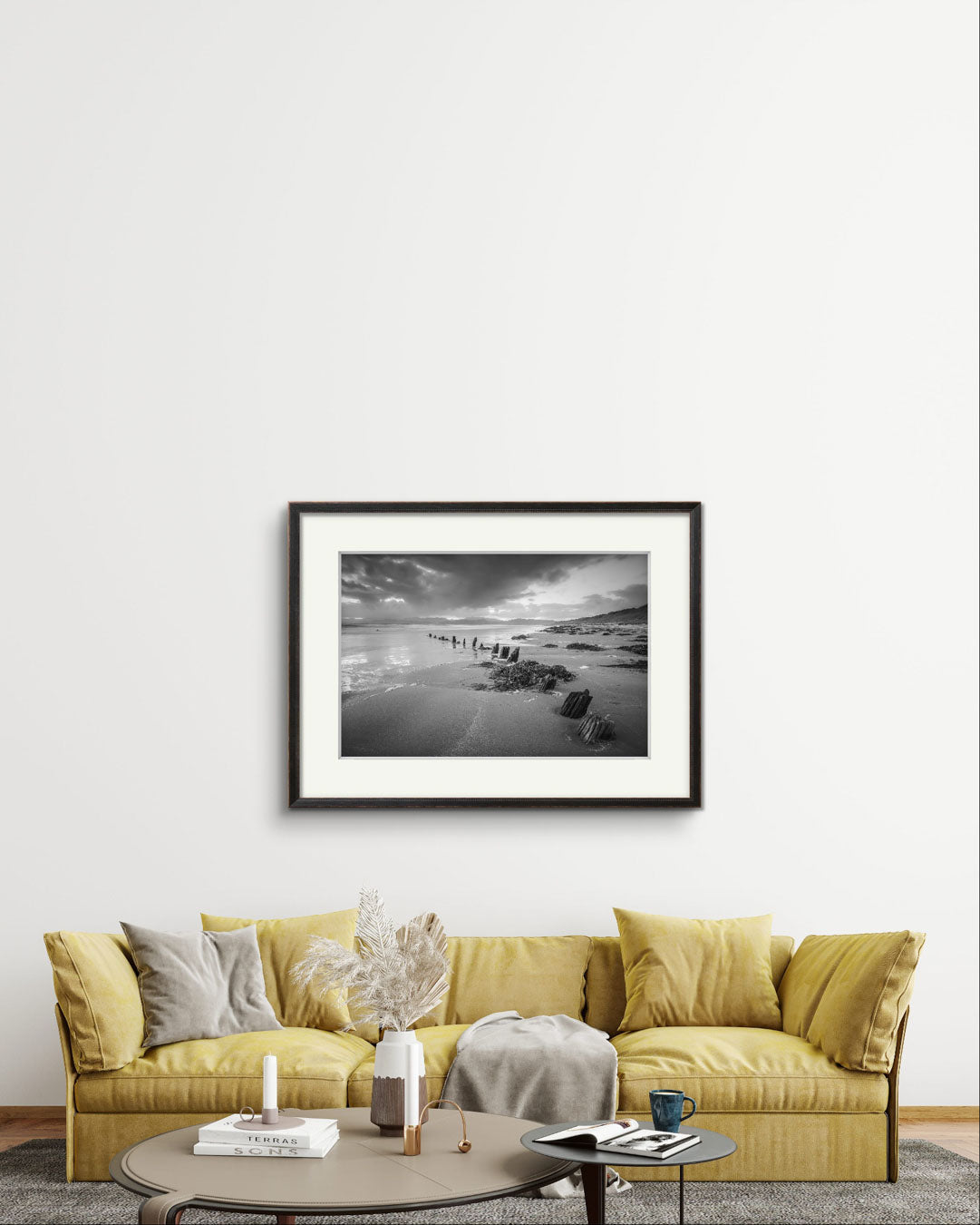 Nice and big yellow sofa and above it black and white photograph of Irish landscape. Fine Art. Wild Atlantic Way. The Sunbeam Wreck. Kerry. Ireland