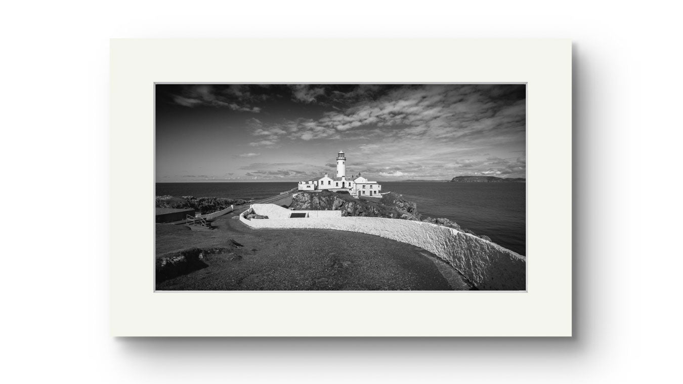 a print of an Irish coastal landscape with a lighthouse in a focal point. Fanad Head. Donegal. Wild Atlantic Way.