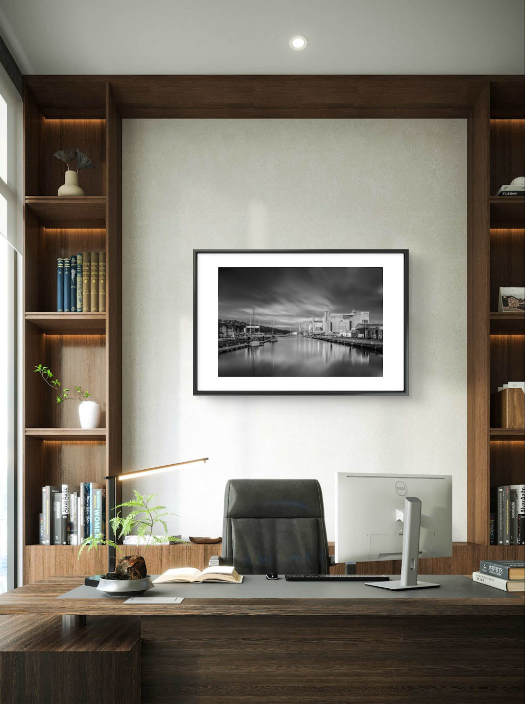 Office settings, Black and white framed photograph of a calm waterfront scene with industrial buildings along the right side and several moored boats on the left. The long exposure effect creates smooth water reflections and soft, streaked clouds in the sky, enhancing the tranquil, moody atmosphere of the port area. Port f Cork, RH Hall, Ireland. Fine Art. Limited Edition