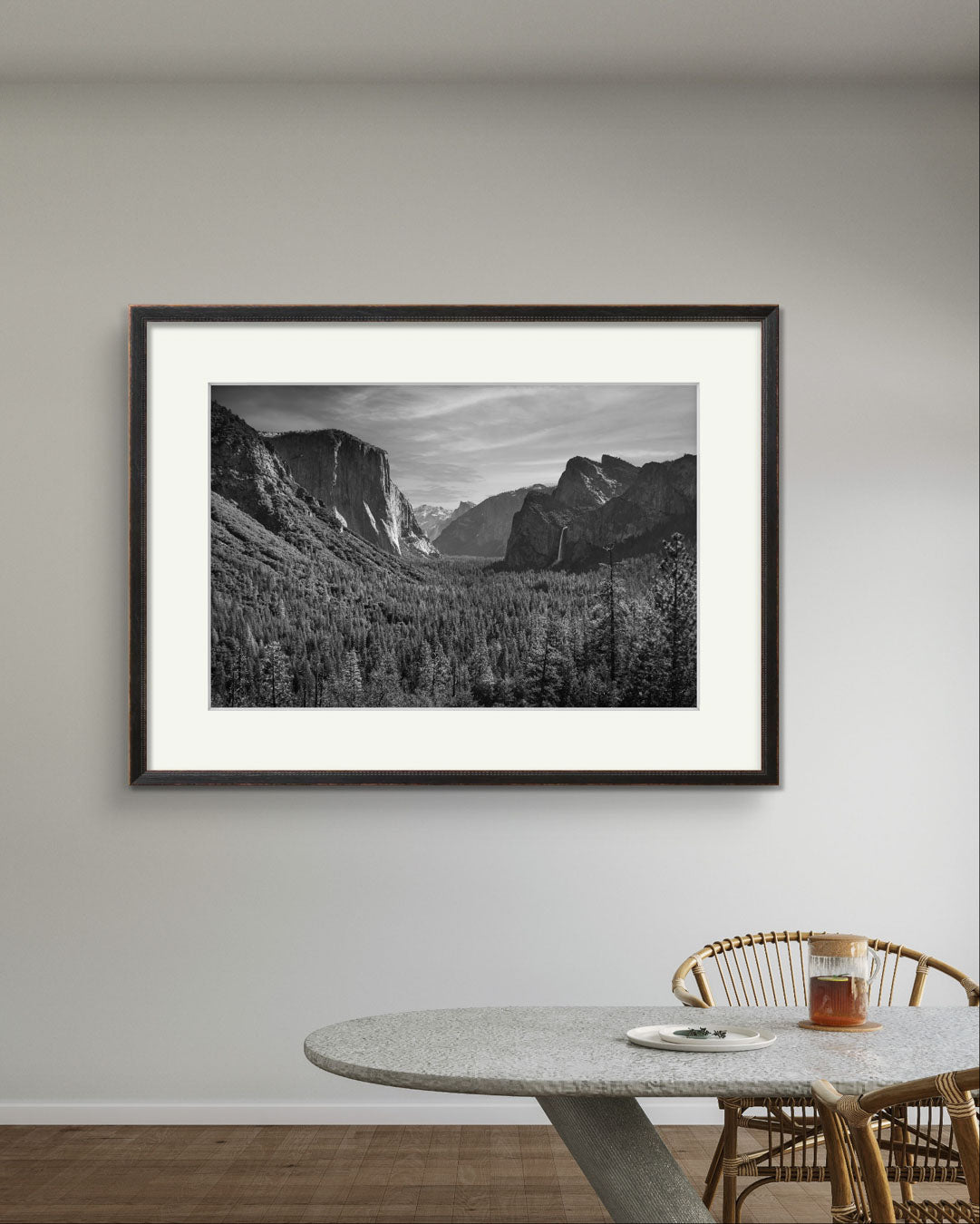 a modern table with brewed tea . on the wall home decor element. Framed fine art photography print of the Yosemite Valley. Made famous by Ansel Adams. Valley View. California. USA