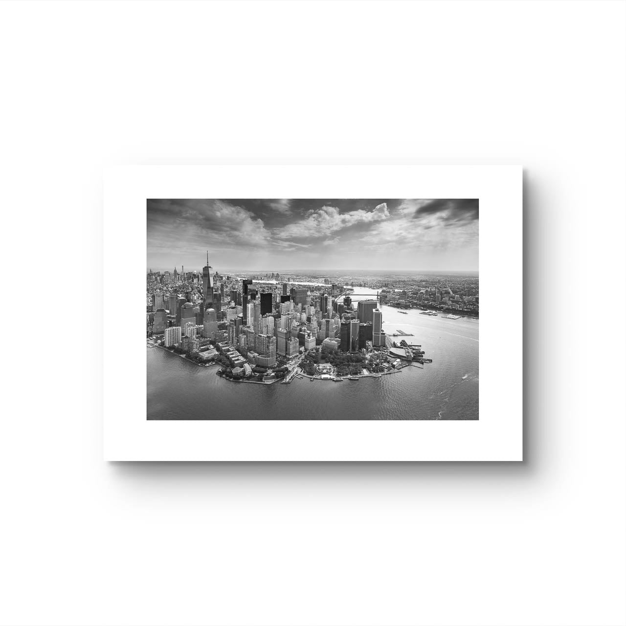 black and white fine art photography Print. No frame. Aerial view of Manhattan. Financial District and towering skyscrapers of Wall Street. New York City.