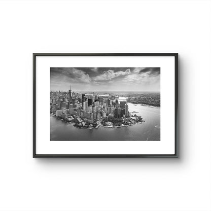 Framed black and white fine art photography Print. Aerial view of Manhattan. Financial District and towering skyscrapers of Wall Street. New York City.